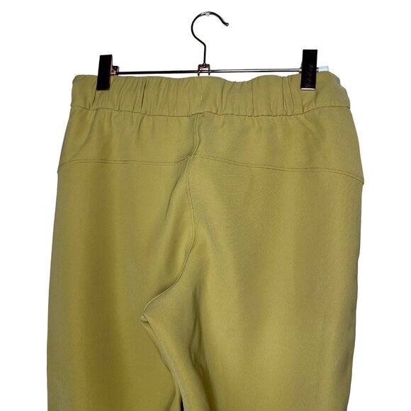 Lululemon On the Fly 7/8 Pant Size 4 Vintage Gold Mustard Yellow Woven - Picture 7 of 10